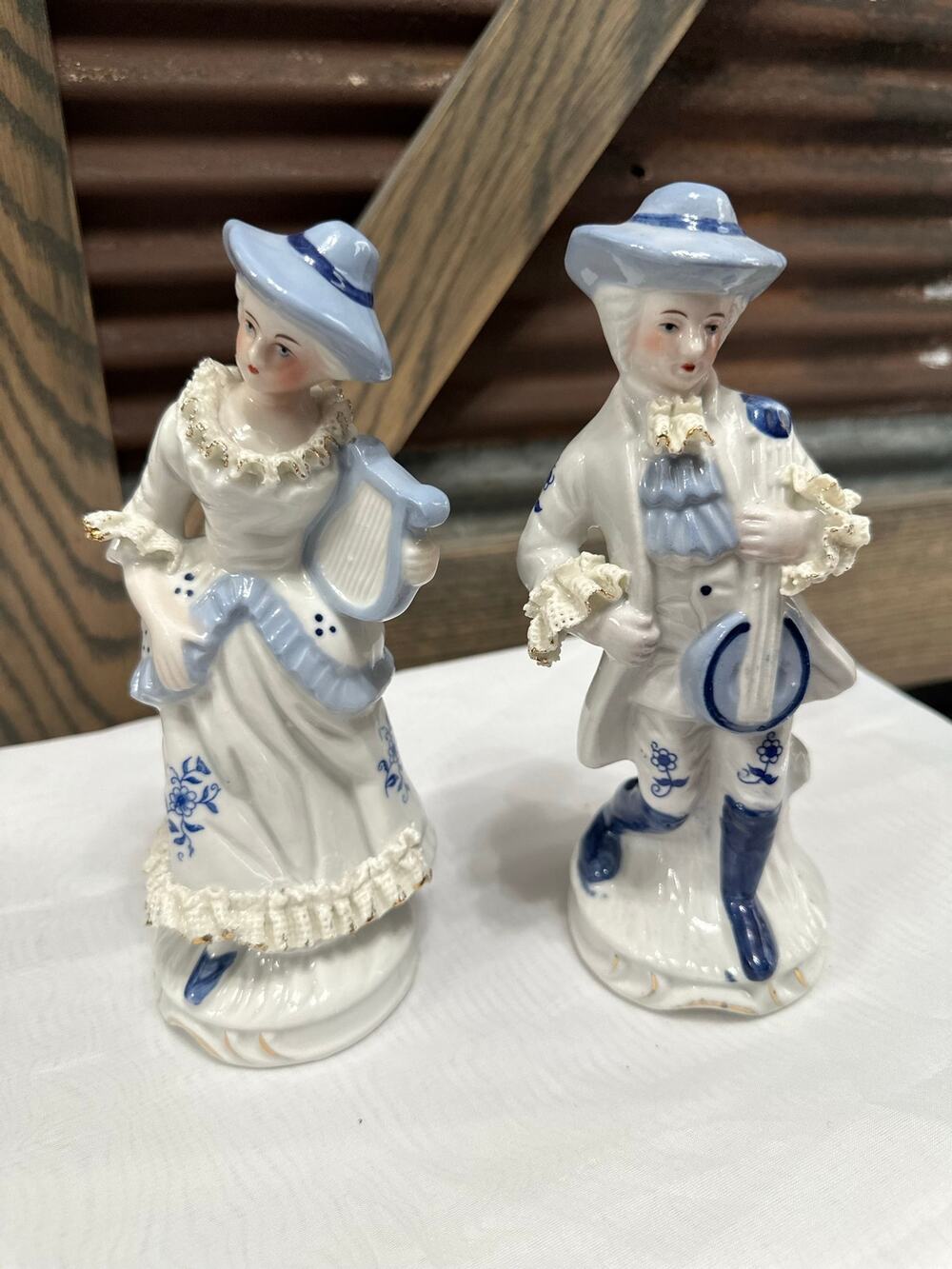 Vintage pair porcelain Victorian/colonial music figurines